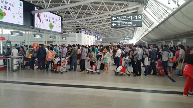 科技成果亮相春运安检现场,人脸识别与扫码齐上阵